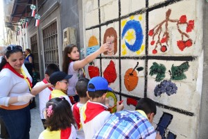 Painting in the streets of Homs: ACN photo