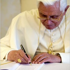 Pope Benedict XVI writing