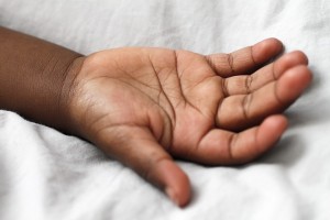 black child's hand