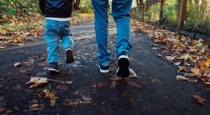 father and son walking