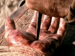 nail-pierced-hand
