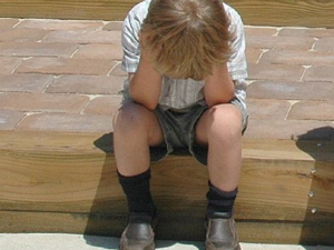 sad child kid outside crying boy