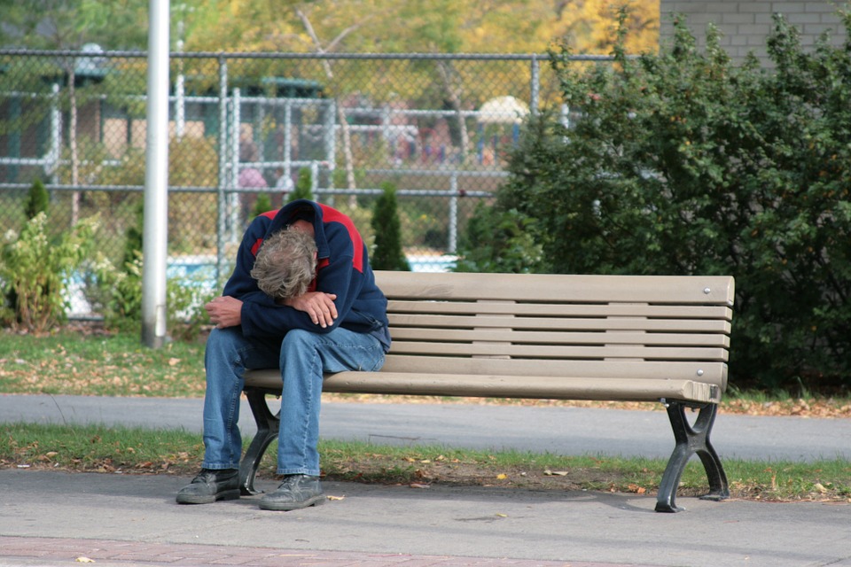 sad man park bench