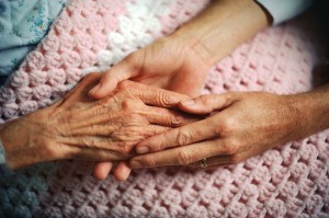 Holding Hands with Elderly Patient aging old